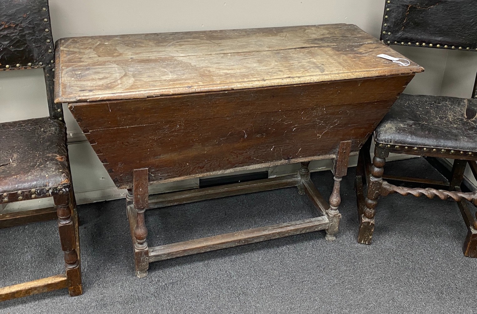 An early 18th century oak dough bin, length 118cm, depth 52cm, height 76cm